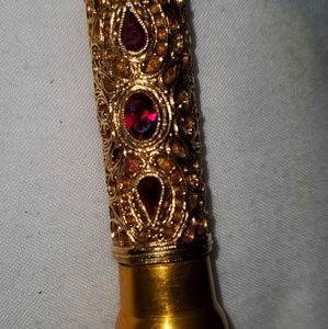 1928 gold filigree flashlight